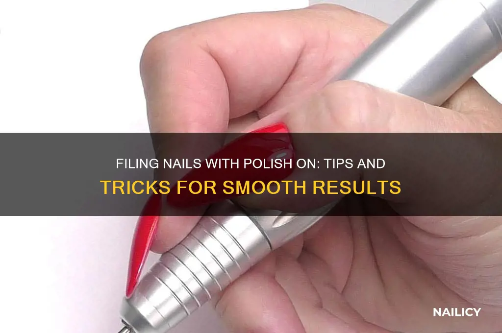 can i file my nails with nail polish on