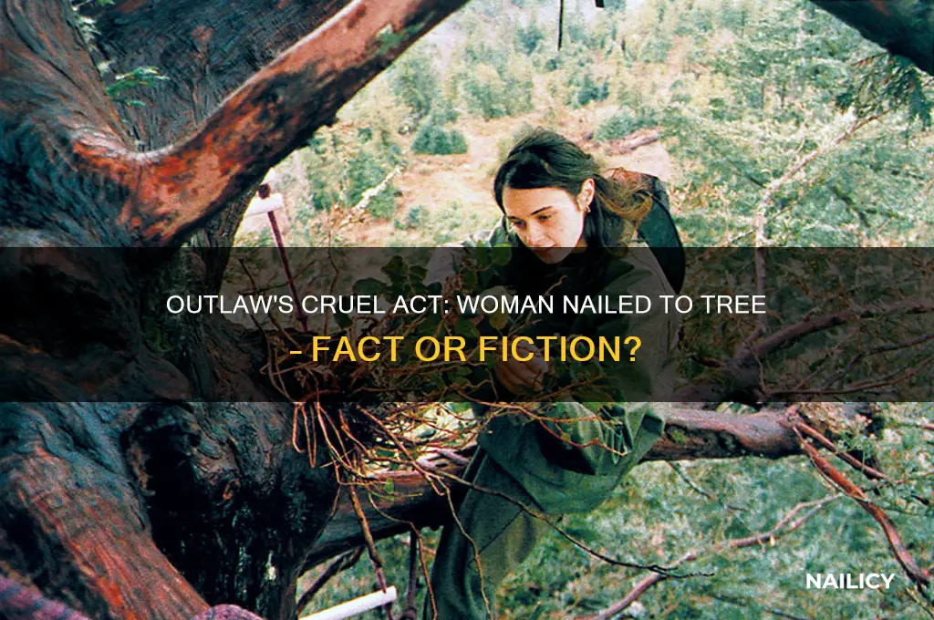 did a outlaw nail woman to tree