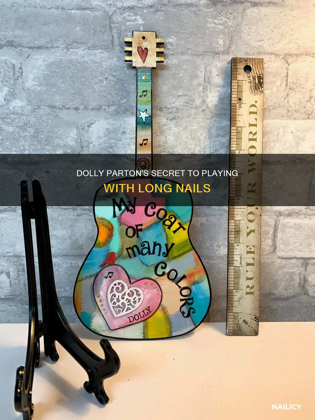 how did dolly parton play with long nails