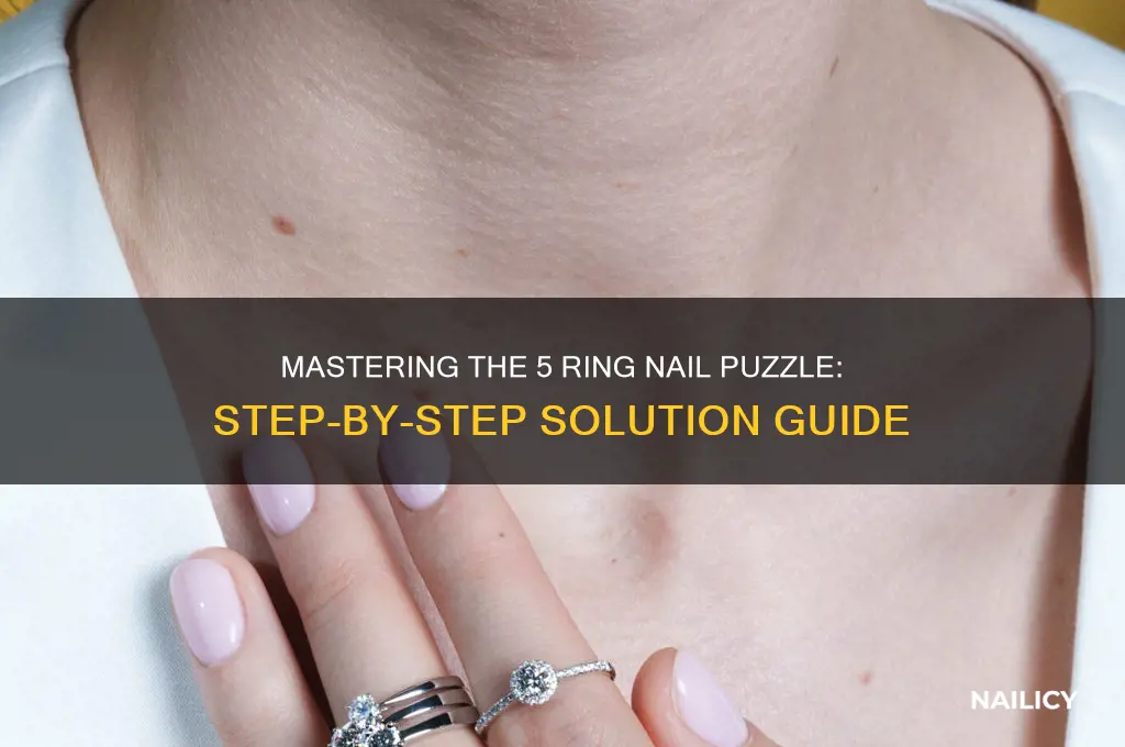 how to break 5 ring nail puzzle