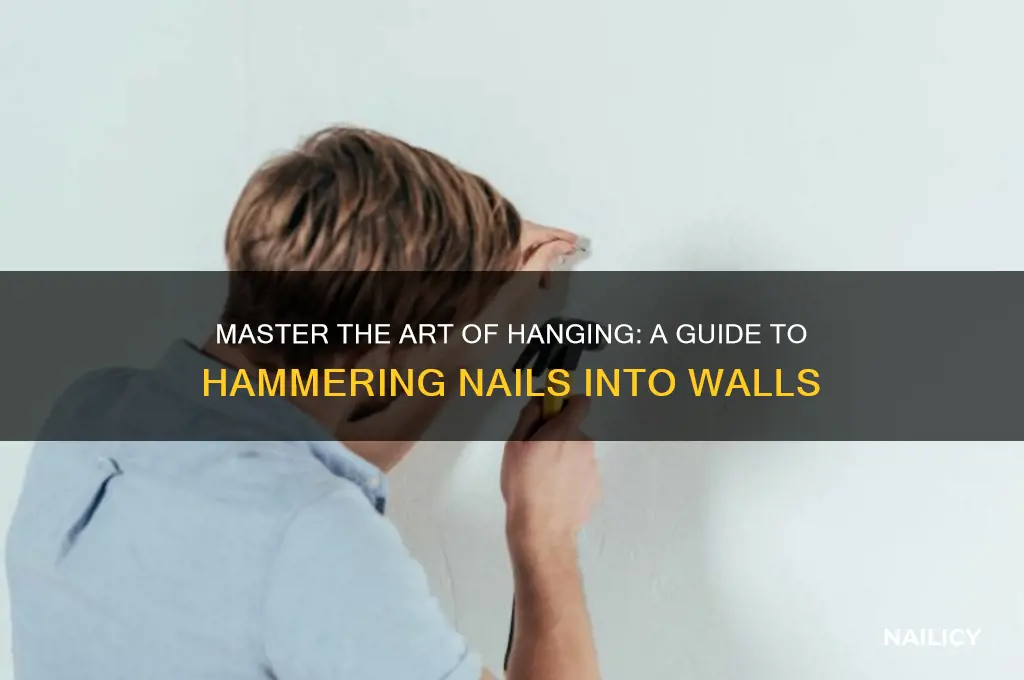 how to hit a nail into the wall
