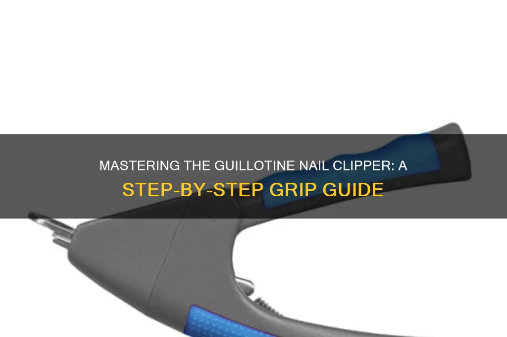 how to hold a guillotine nail clipper