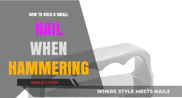 Mastering the Grip: Safely Holding Small Nails for Precision Hammering
