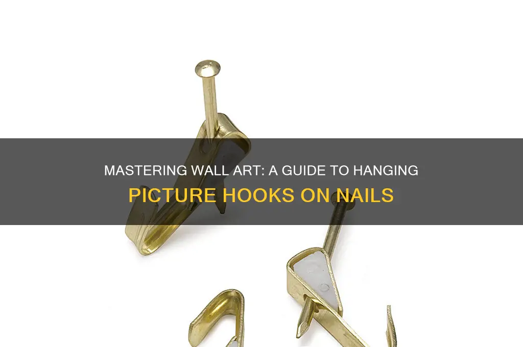 how to place picture hooks on nails