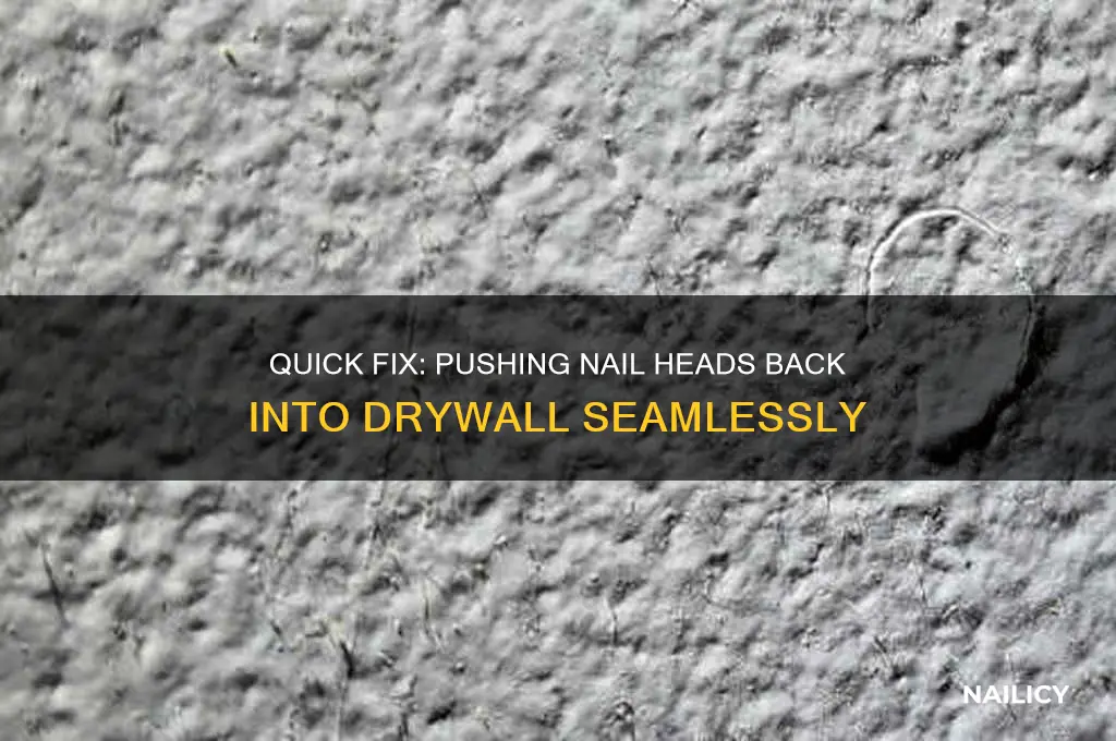 how to push nail heads back into drywall