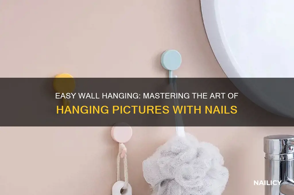 how to put nail in wall for picture