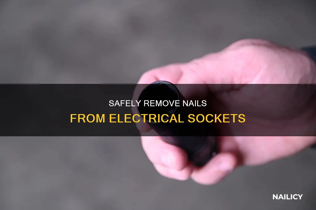 how to remove a nail stuck in electrical socket