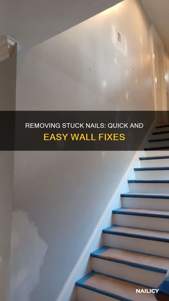 how to remove stuck nail from wall