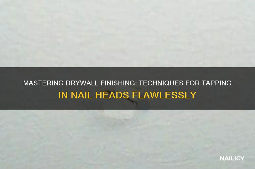 how to tap in nail heads on drywall