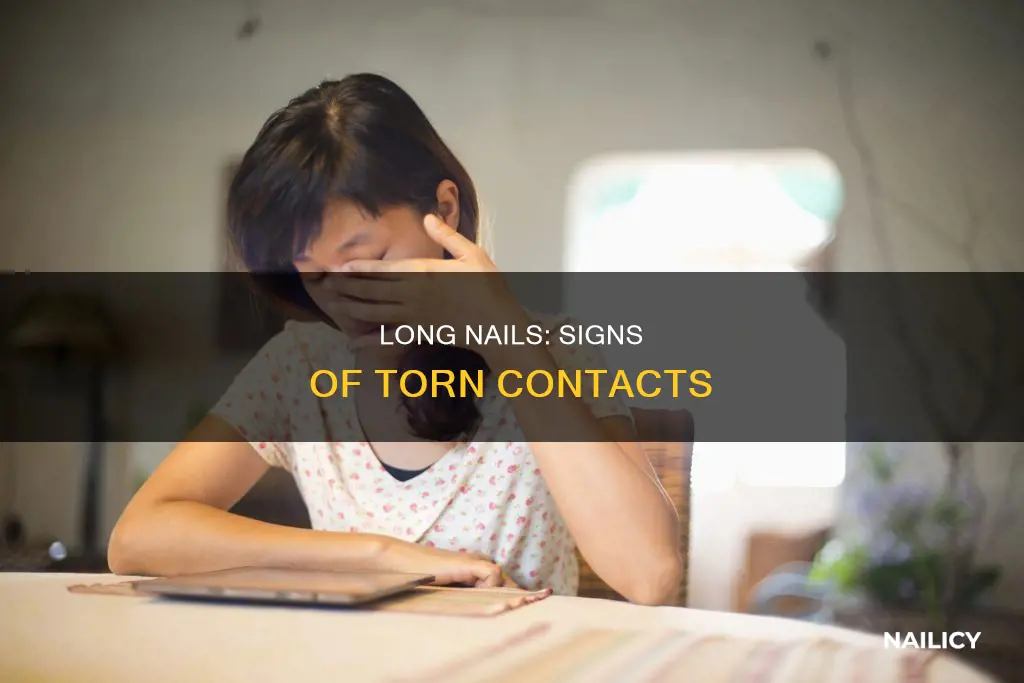 how to tell if your contact is torn long nails