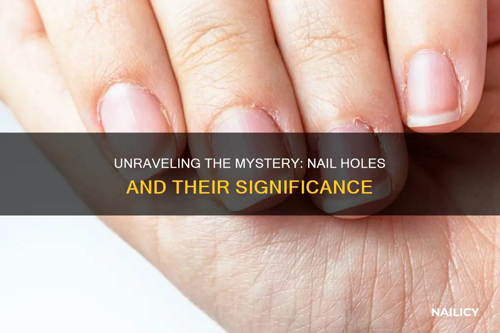 what do little holes in your nails mean