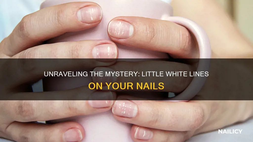 what do little white lines on your nails mean