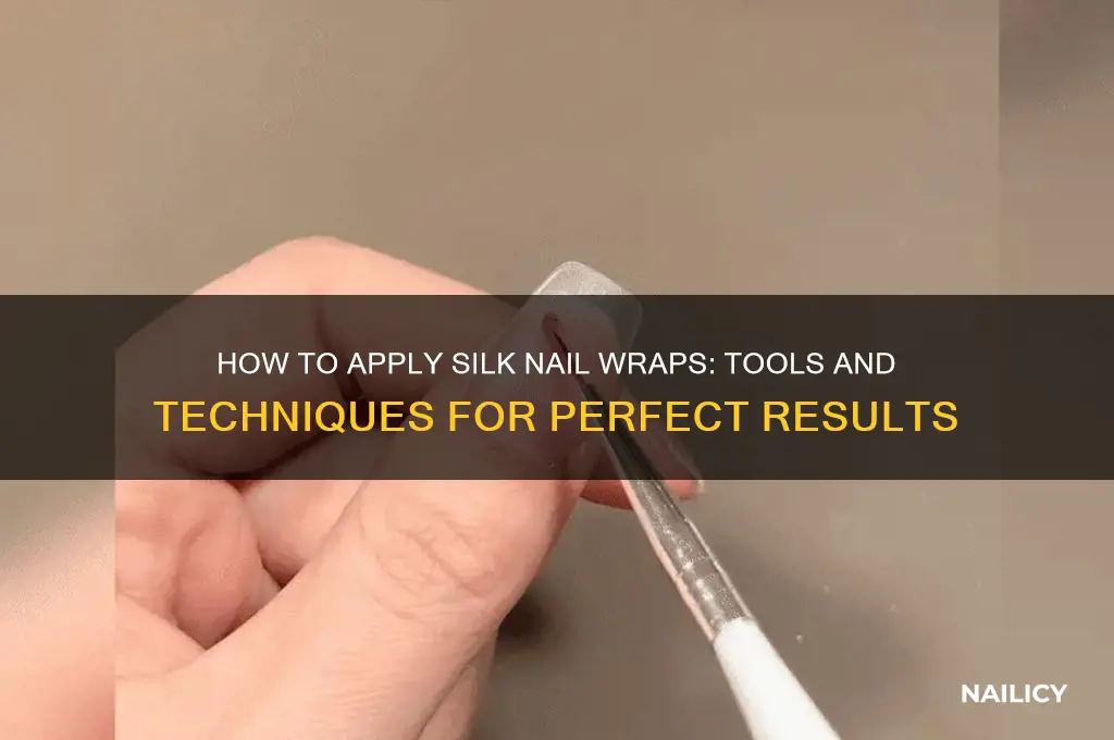 what do you apply silk nail wraps with