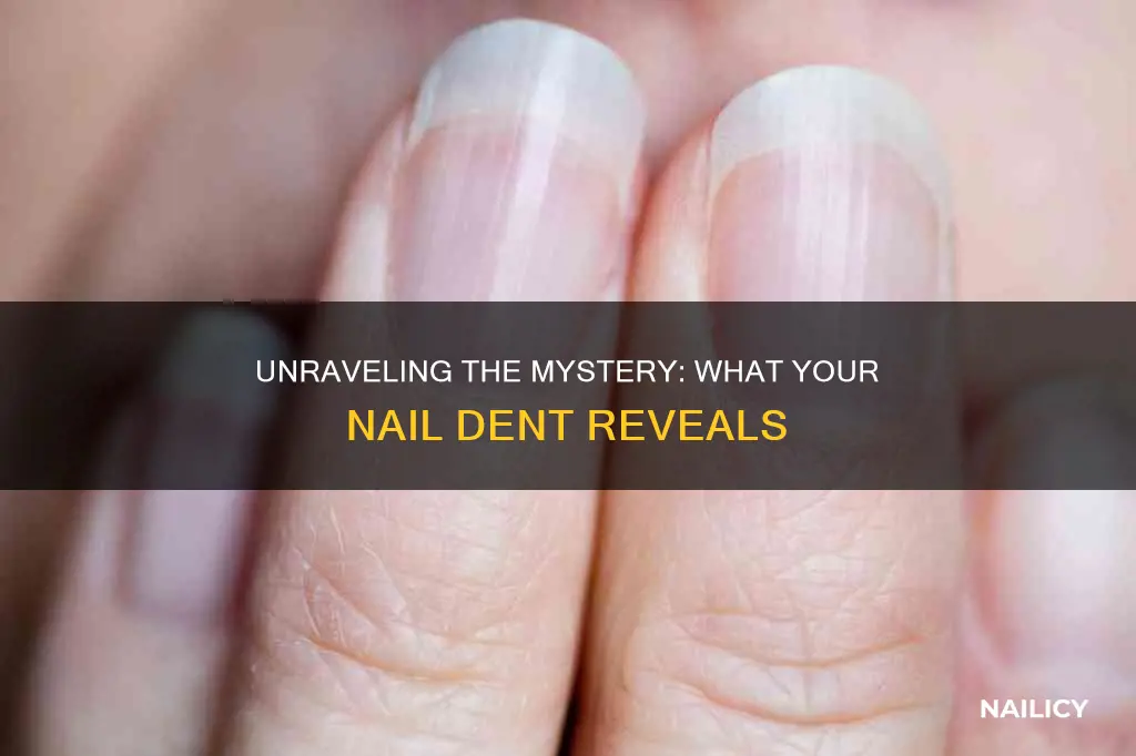 what does a little dent in your nail mean