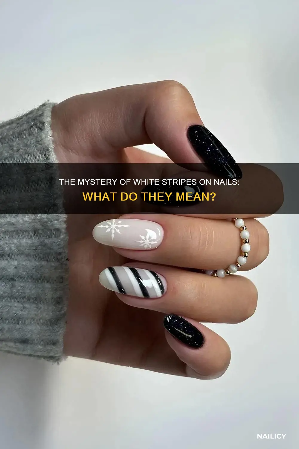 what does the white stripes on your nails mean