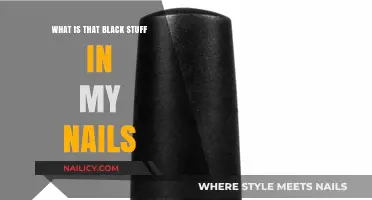 What's That Black Stuff Under My Nails? Causes & Solutions