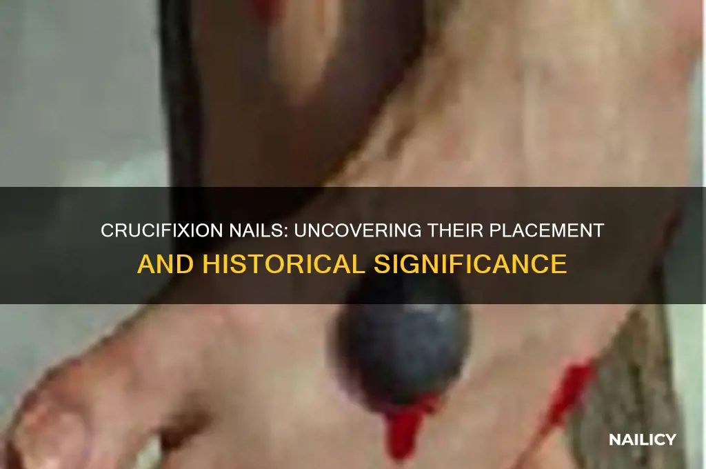 where did the nails go in a crucifixion