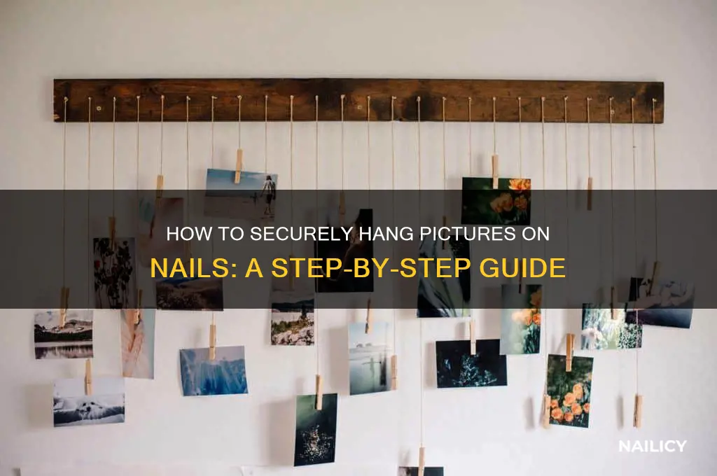 where do i hook picture on nail