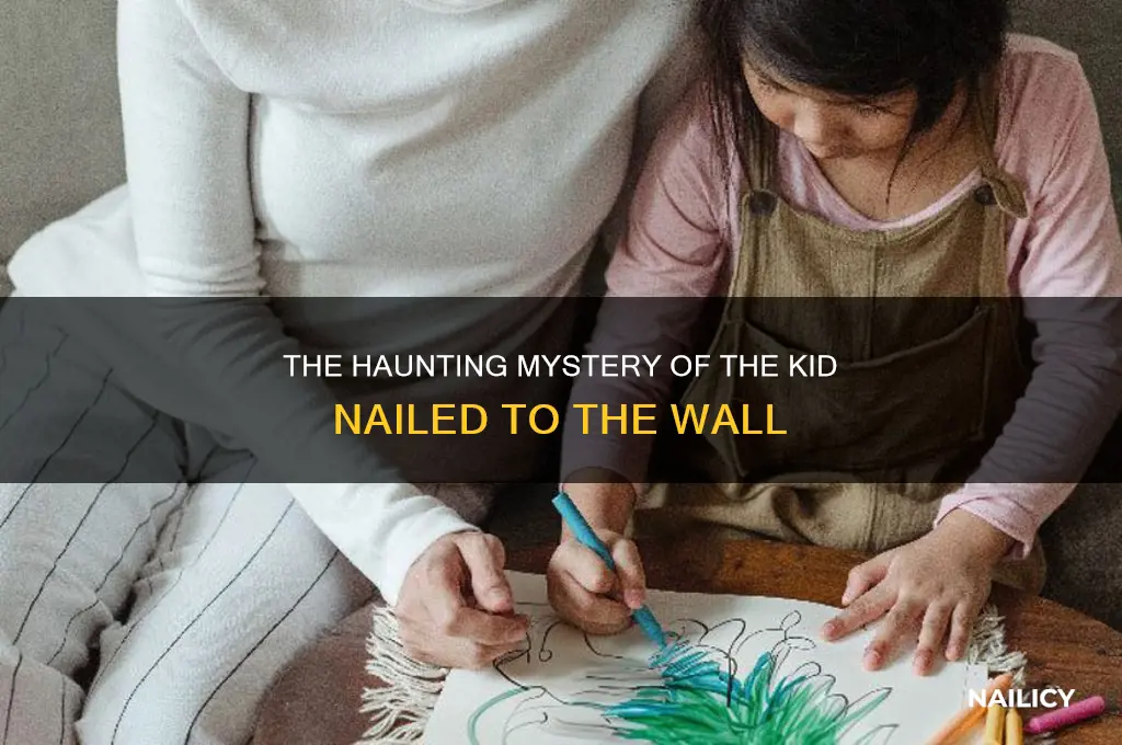 who is the kid nailed to the wall