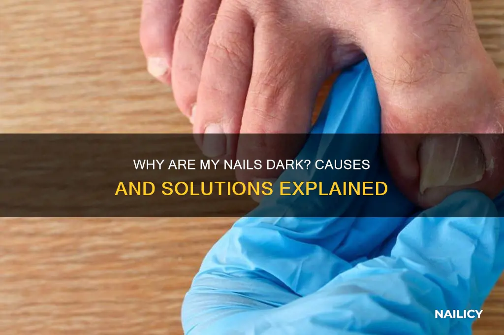 why are my nails dark