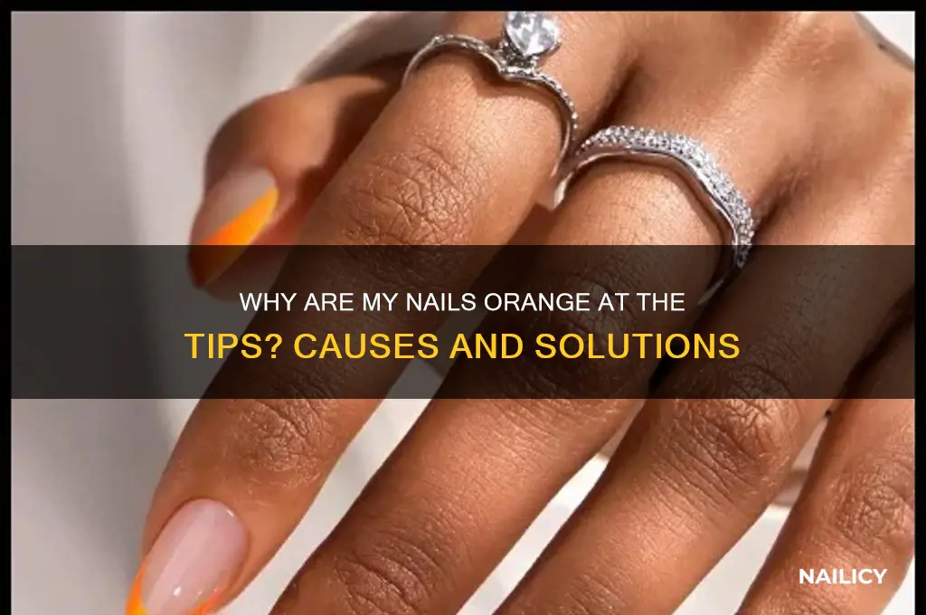 why are my nails orange at the tips