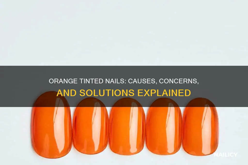 why do my nails have an orange tint