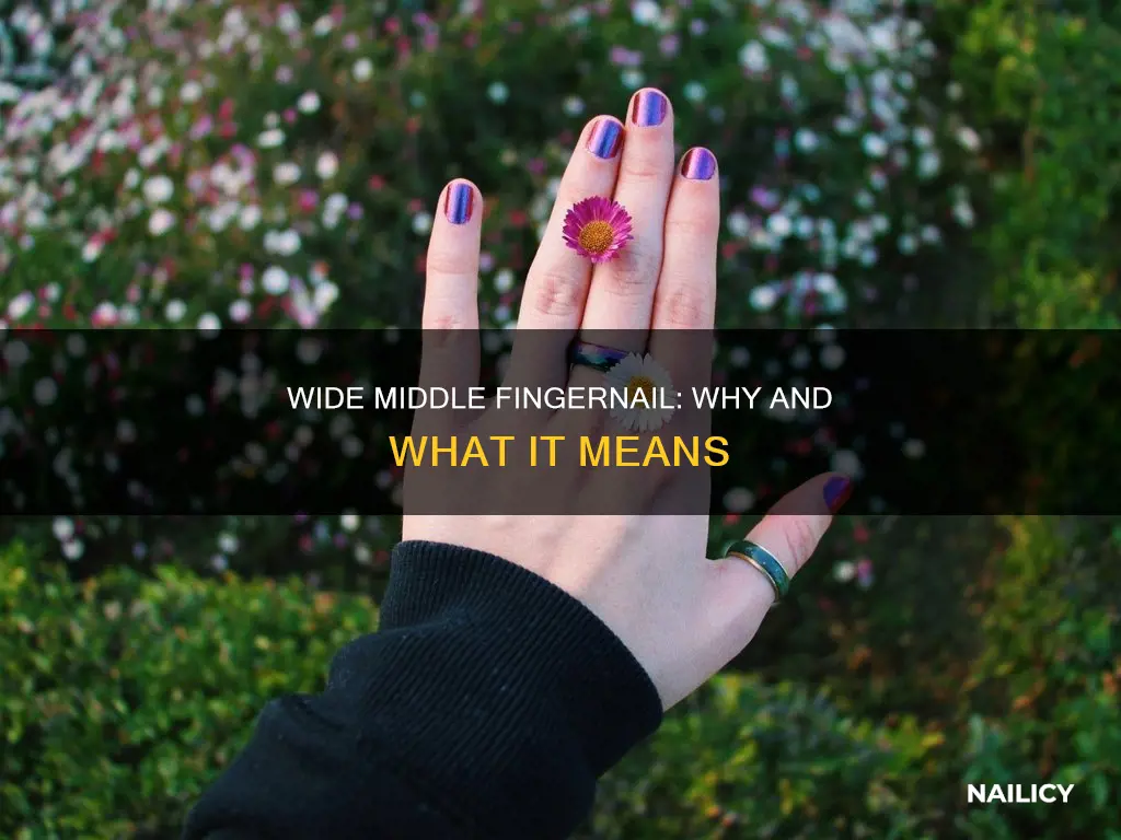 why is my middle finger nail so wide