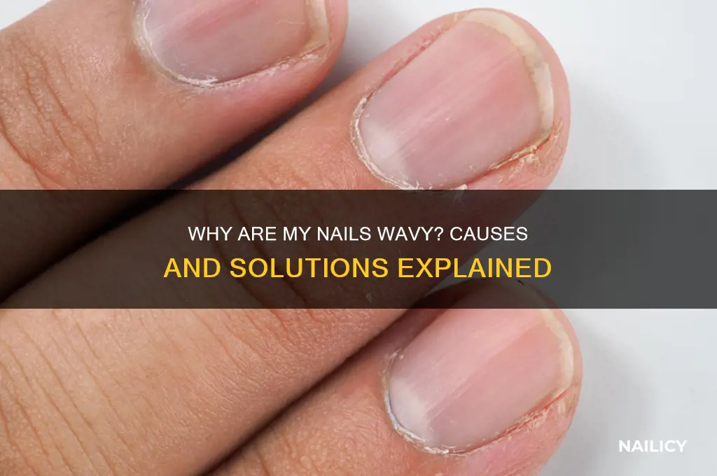 why is my nail wavy